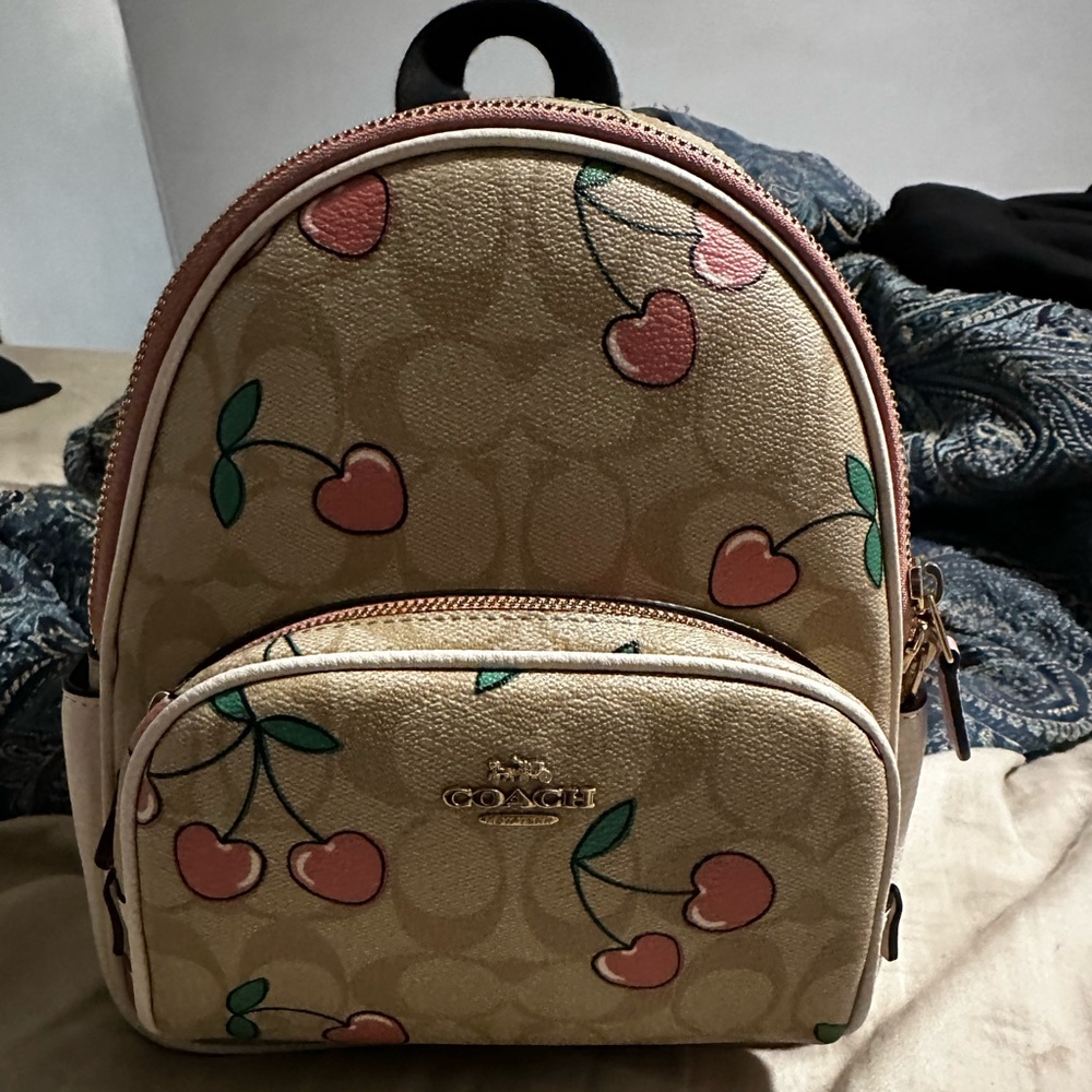 AUTHENTIC COACH BACKPACK WITH WRISTLET